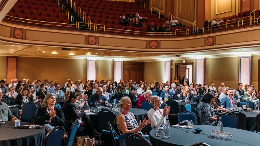 A full plenary audience seated in Hobart City Hall